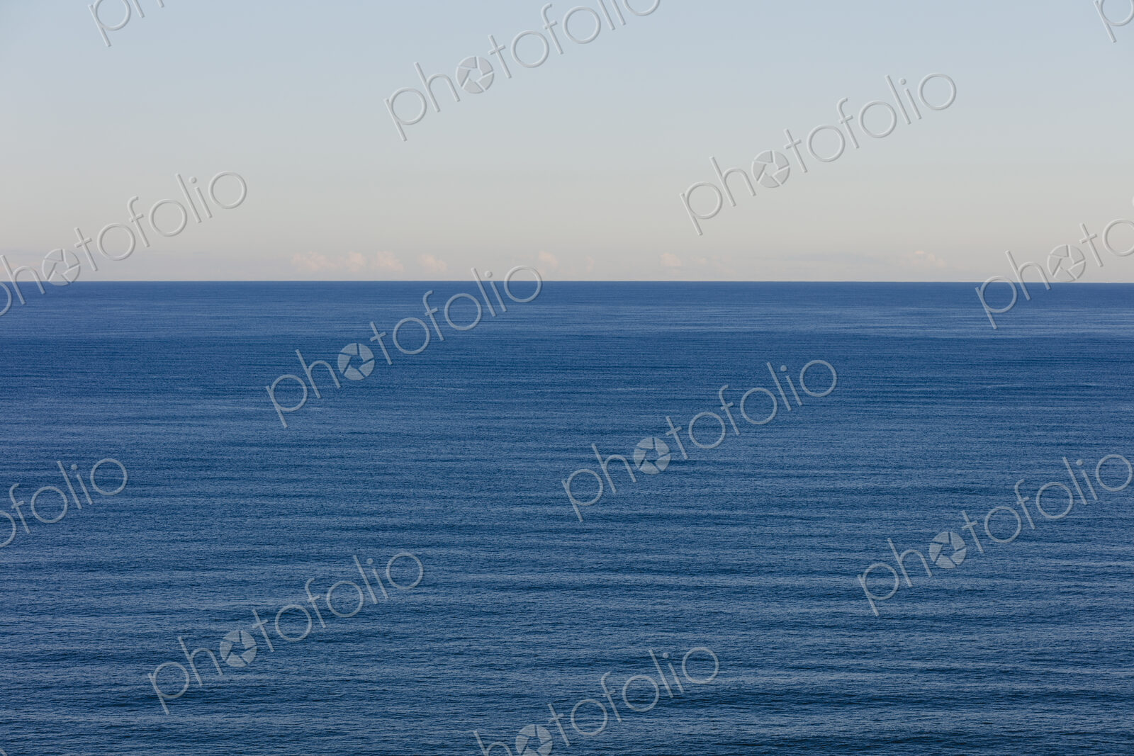View of expansive ocean, horizon and sky at dusk, northern Oregon coast