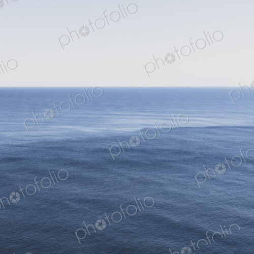 View of expansive ocean, horizon and sky at dusk, northern Oregon coast View of expansive ocean, horizon and sky at dusk, northern Oregon coast