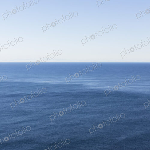 View of expansive ocean, horizon and sky at dusk, northern Oregon coast View of expansive ocean, horizon and sky at dusk, northern Oregon coast