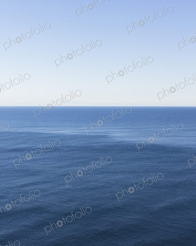 View of expansive ocean, horizon and sky at dusk, northern Oregon coast