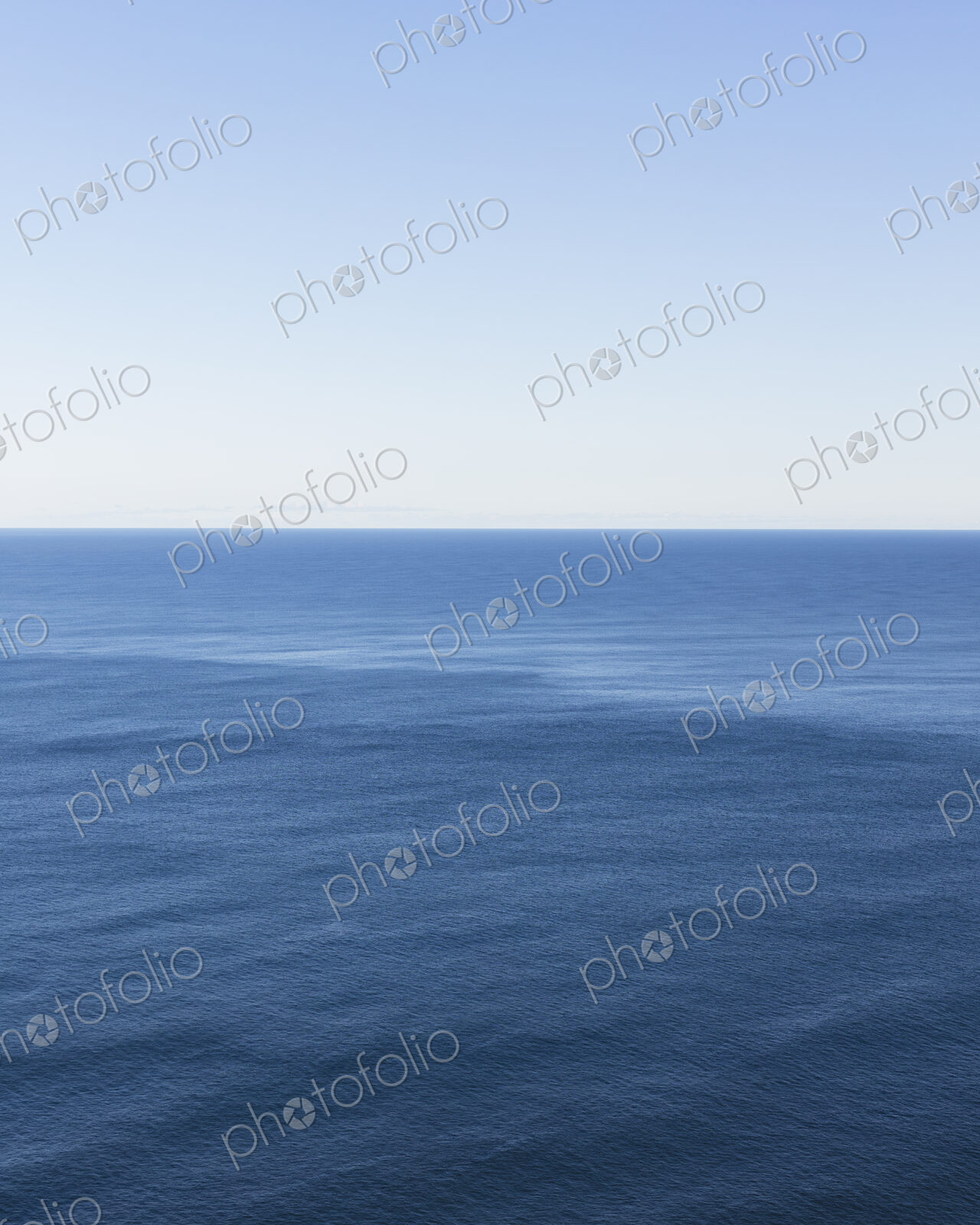 View of expansive ocean, horizon and sky at dusk, northern Oregon coast