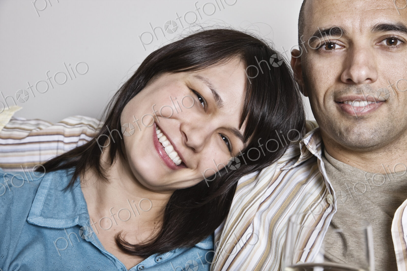 View of hispanic woman and man in their home.