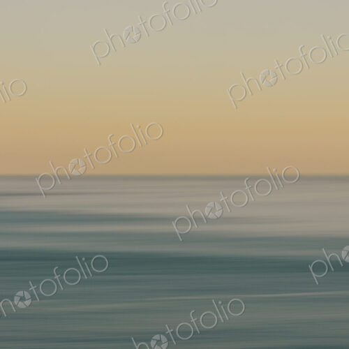 View of ocean, horizon and sky at dawn, blurred motion, northern Oregon coast