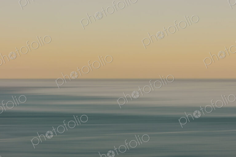 View of ocean, horizon and sky at dawn, blurred motion, northern Oregon coast