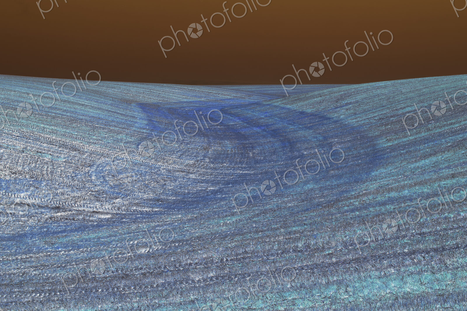 View of rolling hills and farmland, inverted image