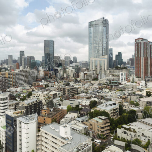 View of the Fukuoka cityscape from a rooftop terrace. View of the Fukuoka cityscape from a rooftop terrace.