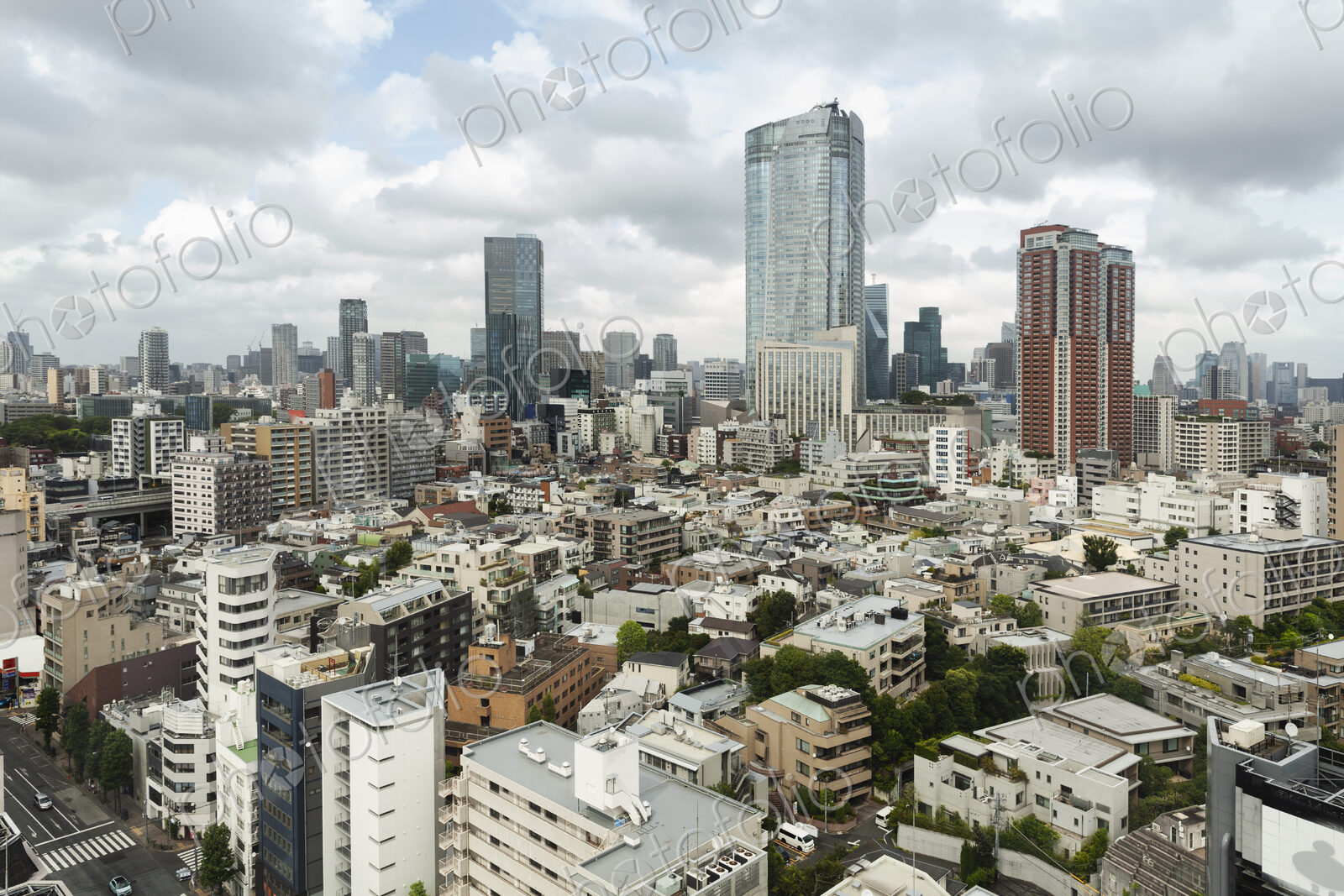 View of the Fukuoka cityscape from a rooftop terrace.