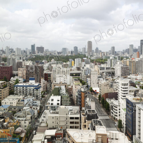 View of the Fukuoka cityscape from a rooftop terrace. View of the Fukuoka cityscape from a rooftop terrace.