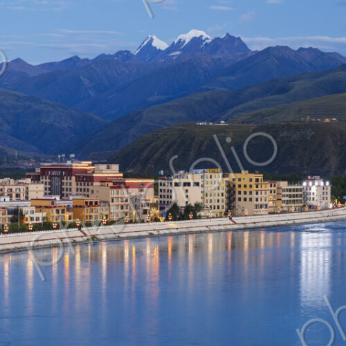 View of the Garze River and Kawaluori Mountain (5,992m) at Dusk Garze, Sichuan… View of the Garze River and Kawaluori Mountain (5,992m) at Dusk Garze, Sichuan…