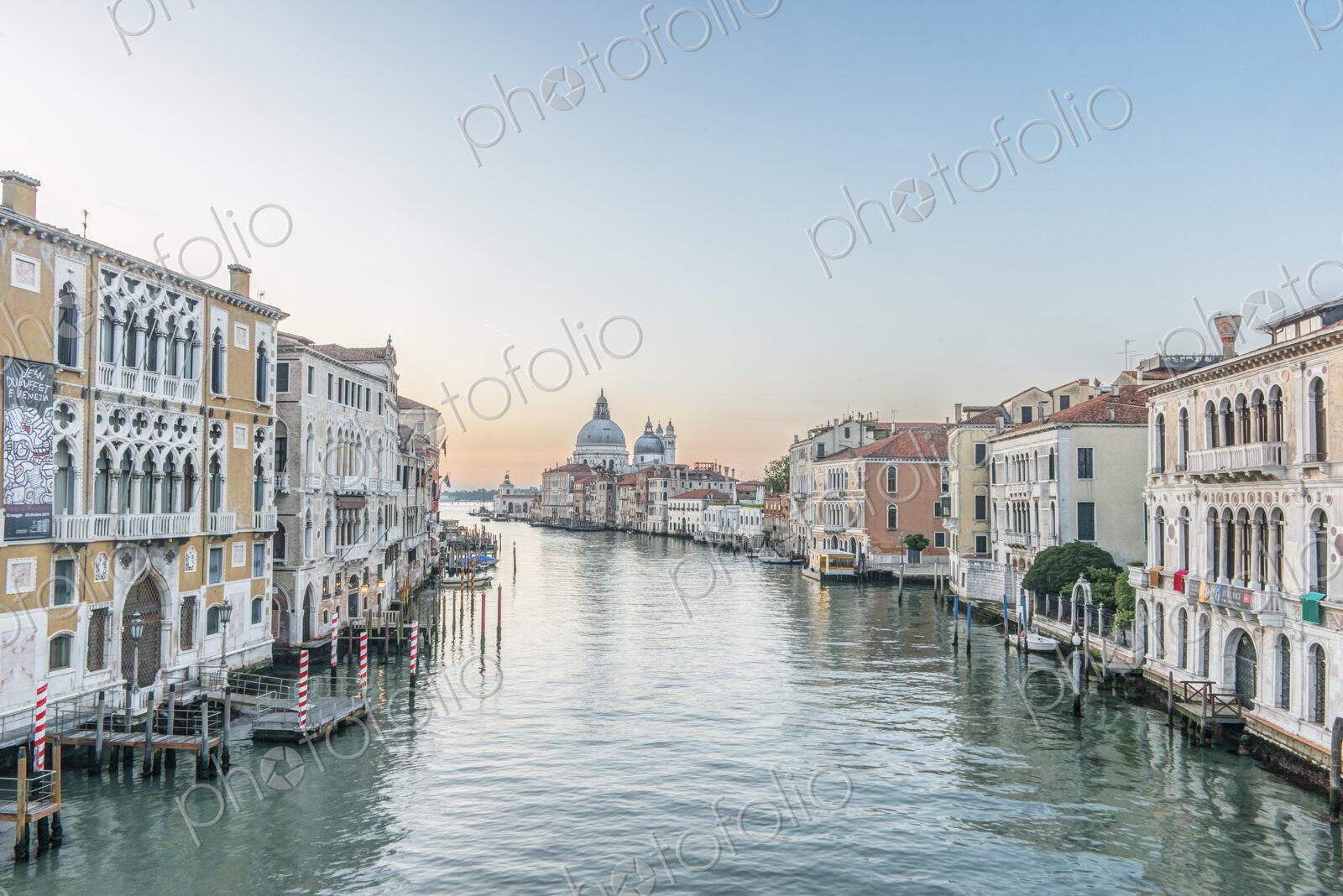 View of the Grand Canal in Venice with St Mark’s Basilica dome in the distance.