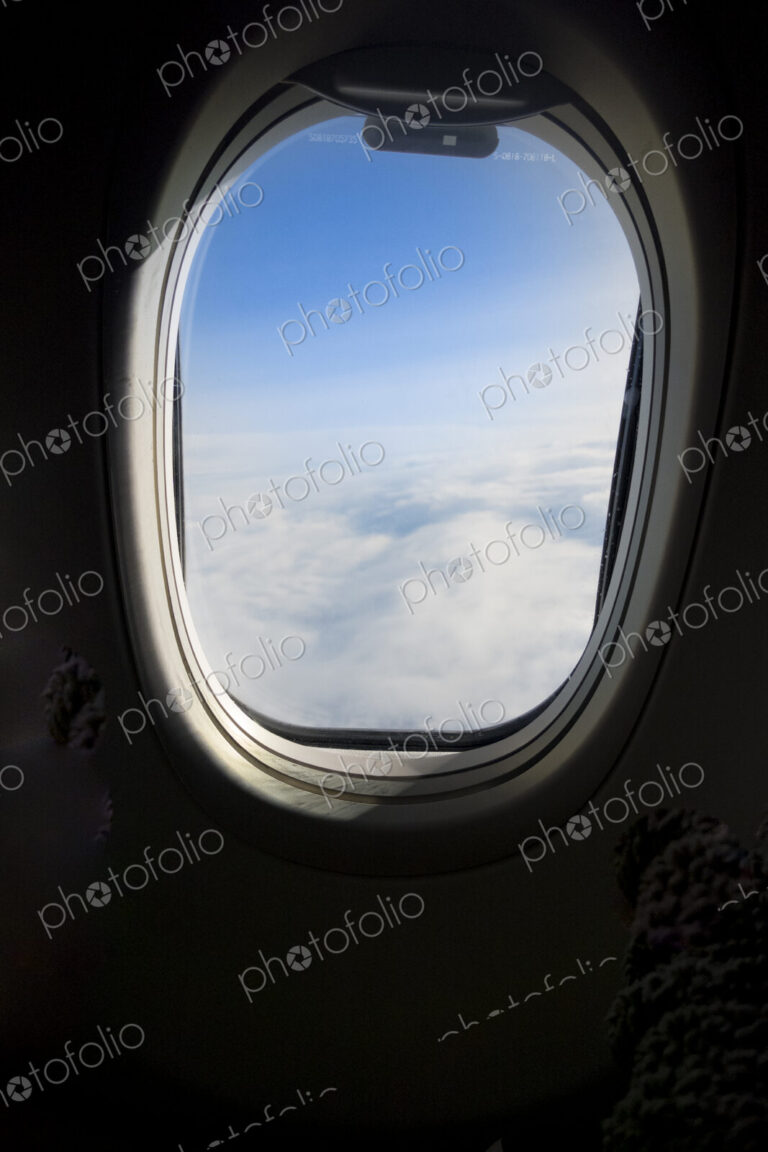 View of the clouds from an aircraft window.