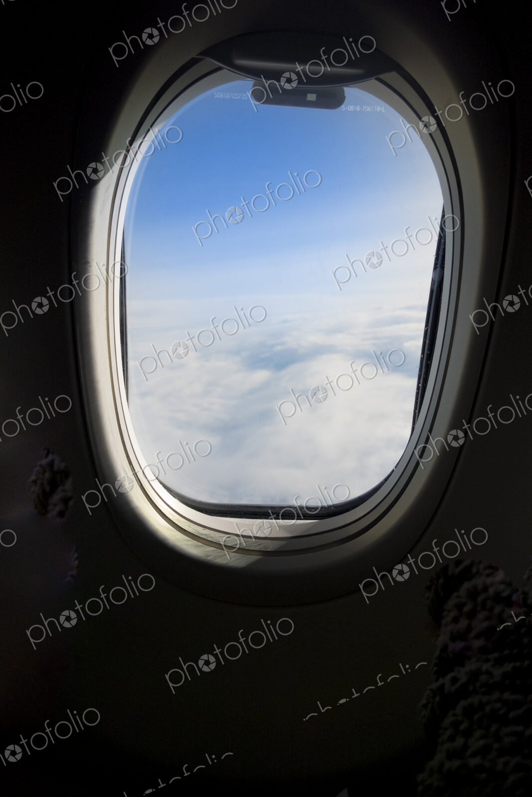View of the clouds from an aircraft window.