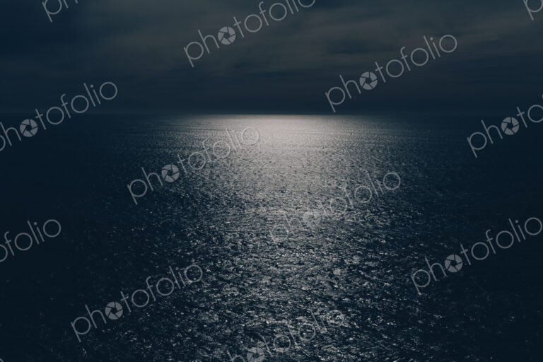 View out over the ocean at night, moonlight on the water, Oswald West State Park, Oregon