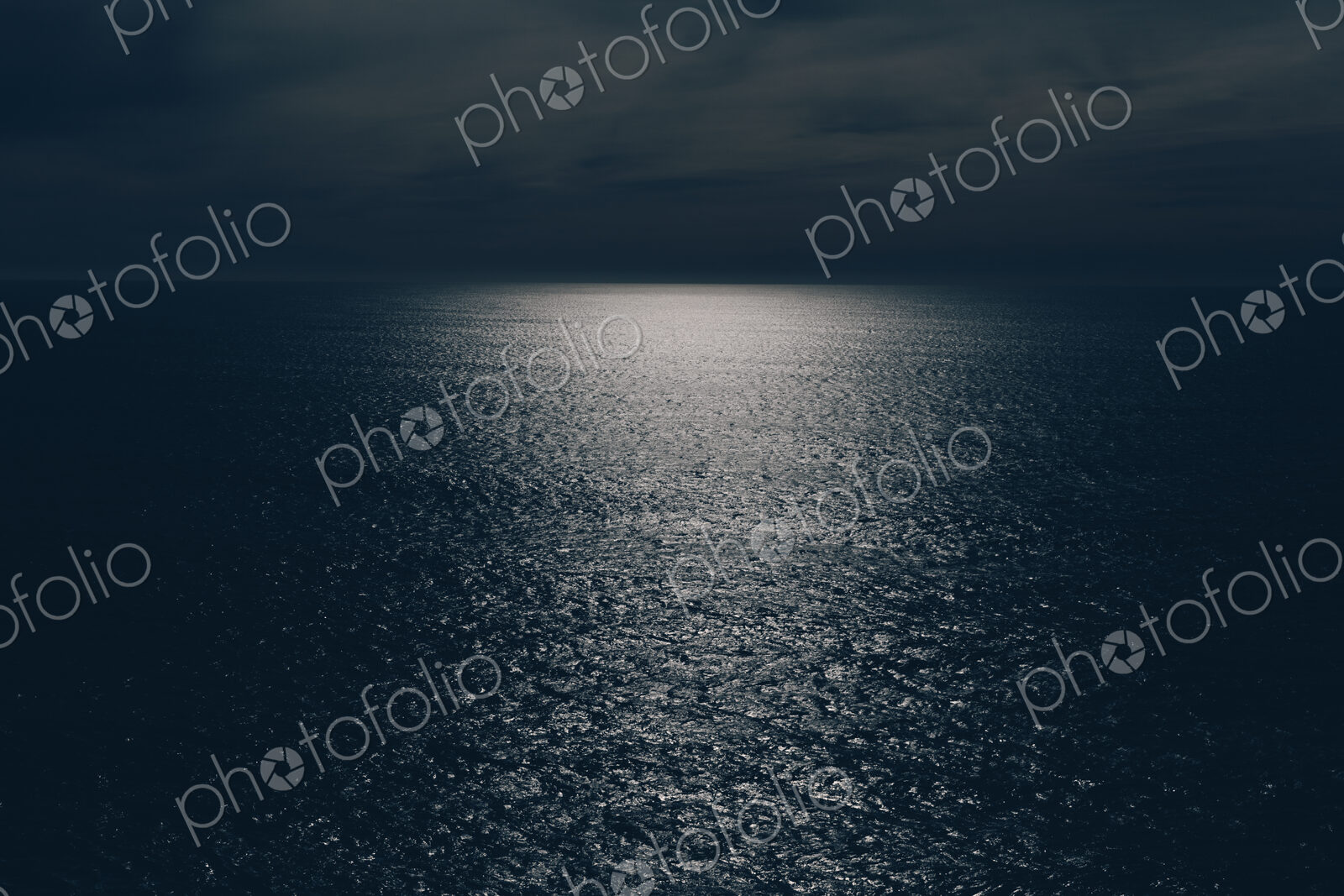 View out over the ocean at night, moonlight on the water, Oswald West State Park, Oregon