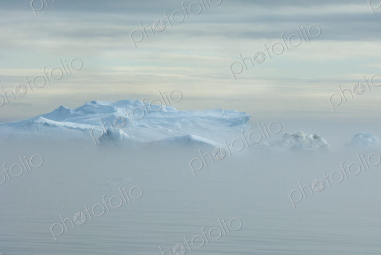 View over the iceberg and land mass off Baffin Bay in Greenland.