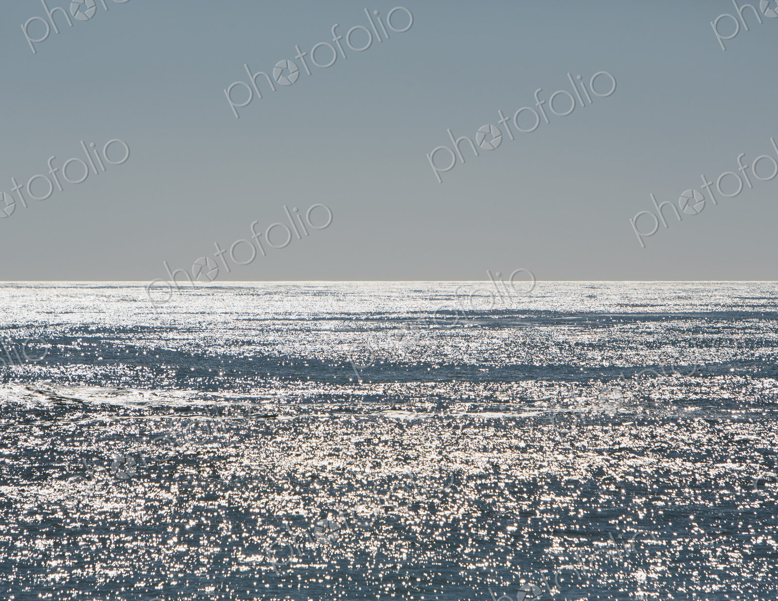 View over the sea and the Pacific Ocean at dusk, near Big Sur, on the California coast.