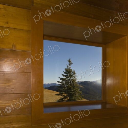 View through a cabin window from Hurricane Ridge to the Olympic Mountains and Olympic… View through a cabin window from Hurricane Ridge to the Olympic Mountains and Olympic…