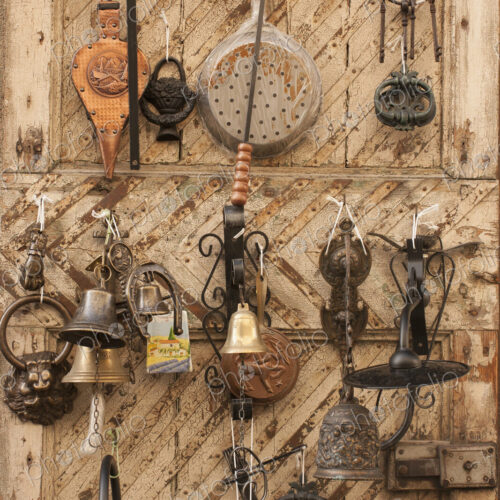 Vintage Tuscan metal household items displayed for sale.