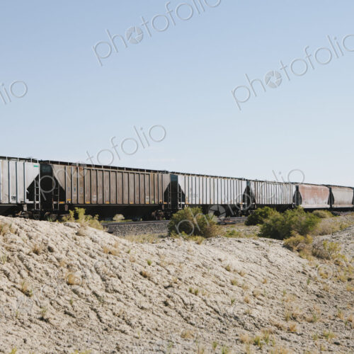 Wagons of a train crossing the Black Rock Desert. Wagons of a train crossing the Black Rock Desert.