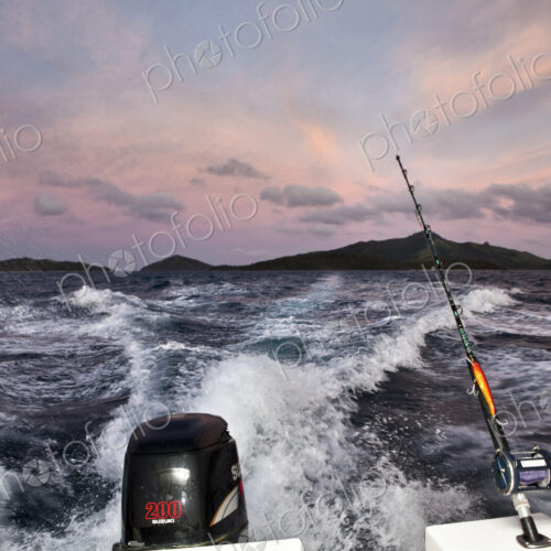 Wake From Fishing Boat At Sunrise