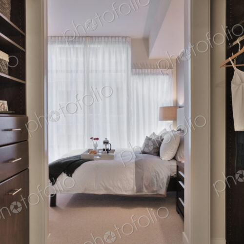 Walk-in closet in luxury master bedroom Walk-in closet in luxury master bedroom