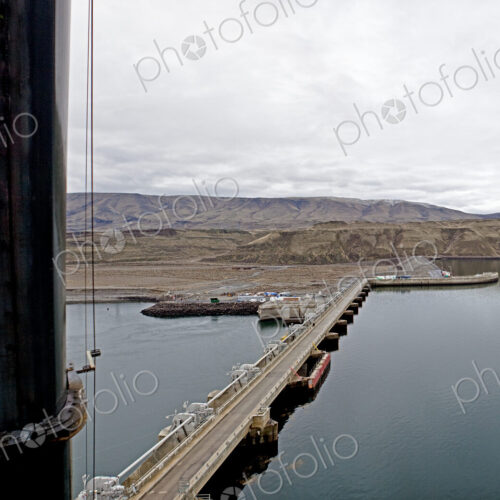 Wanapum dam with bridge over water.
