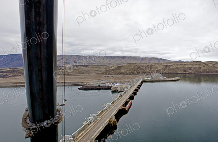 Wanapum dam with bridge over water.