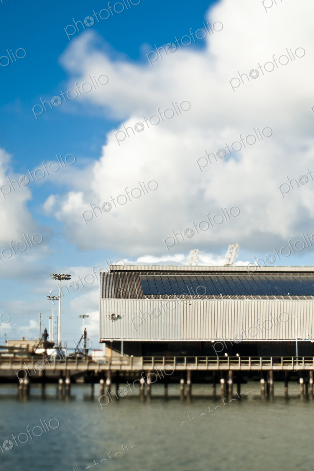 Warehouse and Cranes At a Seaport