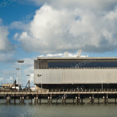 Warehouse and Cranes At a Seaport