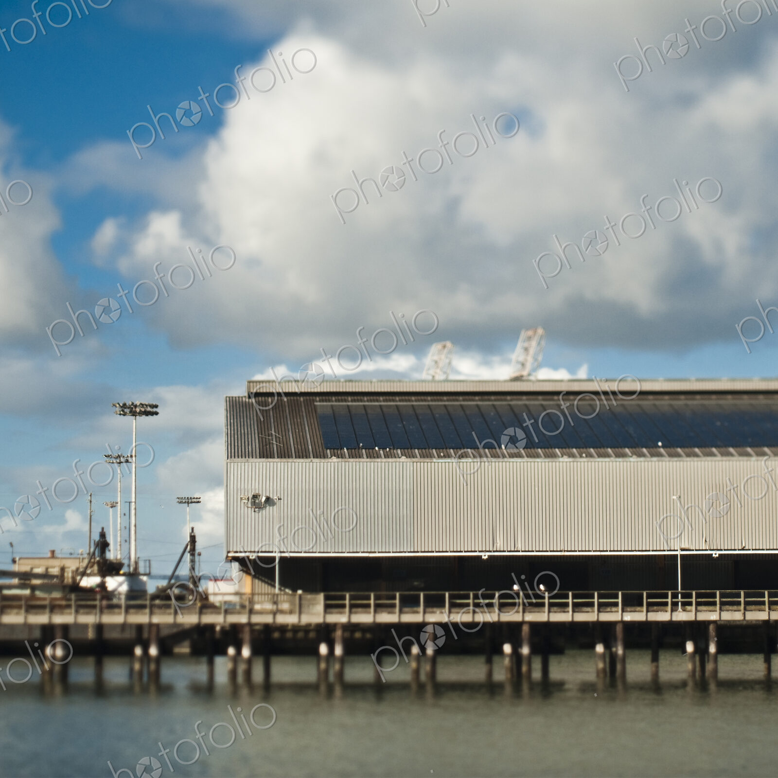 Warehouse and Cranes At a Seaport