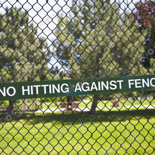 Warning Sign on Chain Fence Warning Sign on Chain Fence