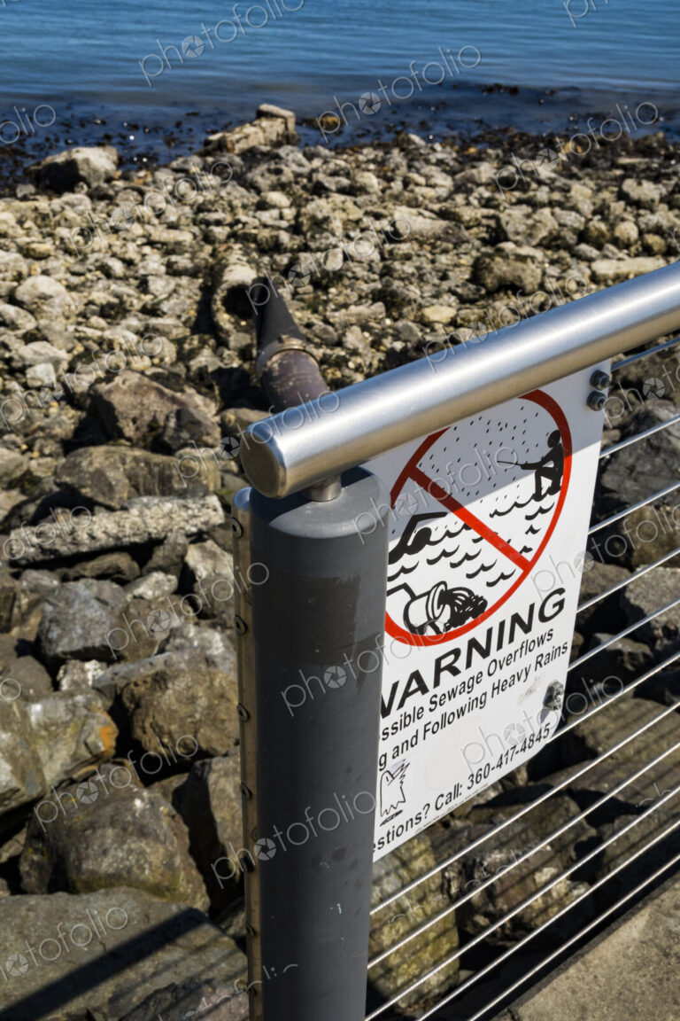 Warning sign for sewage outflow pipe on the Port Angeles waterfront.