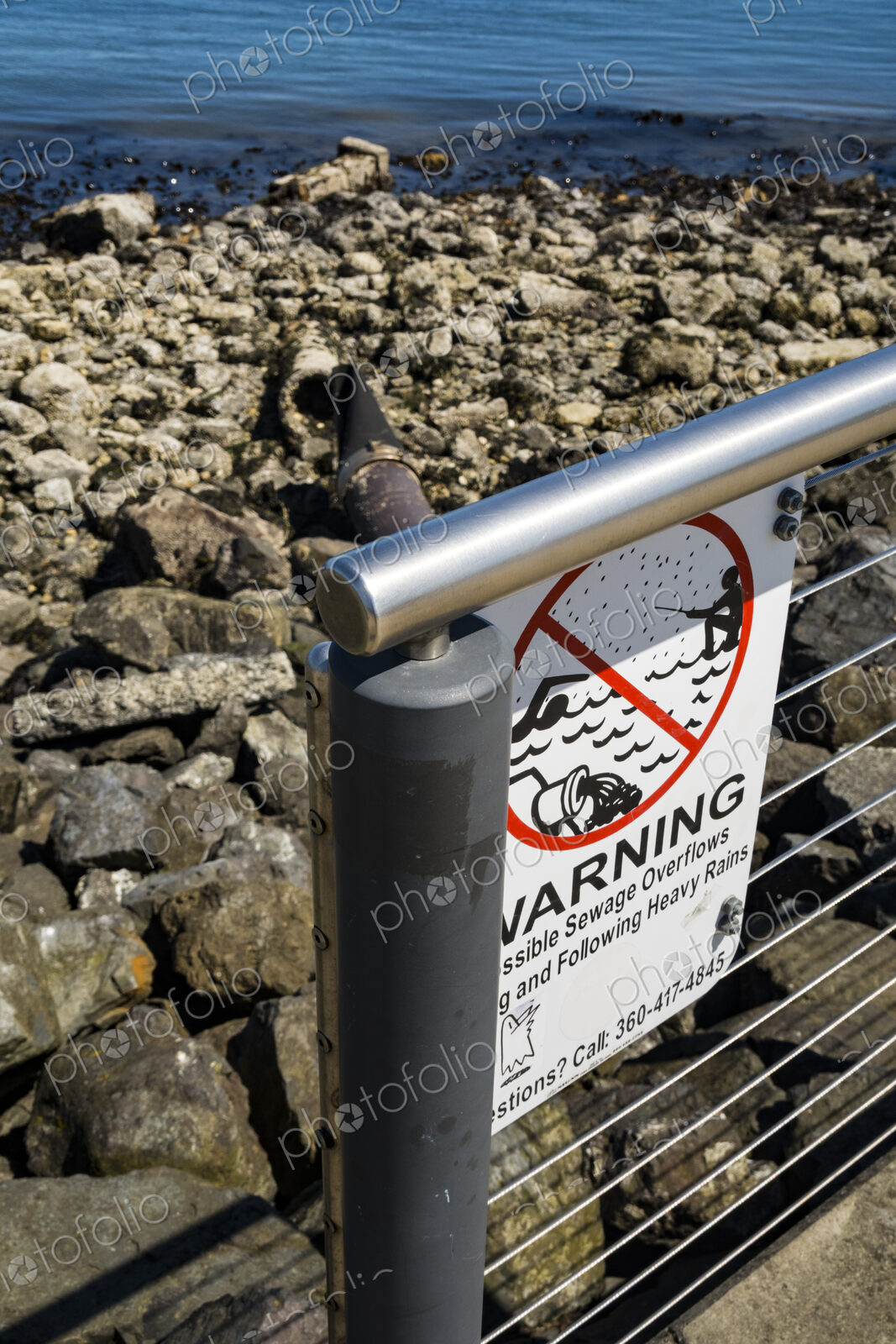 Warning sign for sewage outflow pipe on the Port Angeles waterfront.