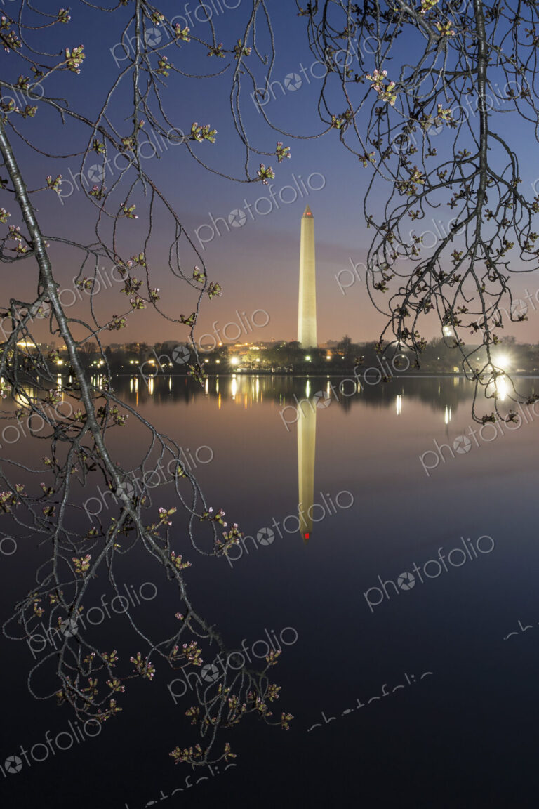 Washington Monument at dawn reflected in the lake.
