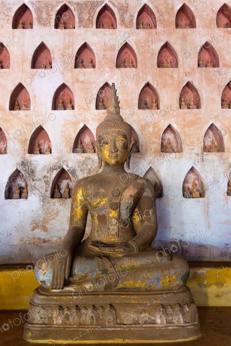 Wat Si Saket, a collection of statues in wall niches, Vientiane, Laos