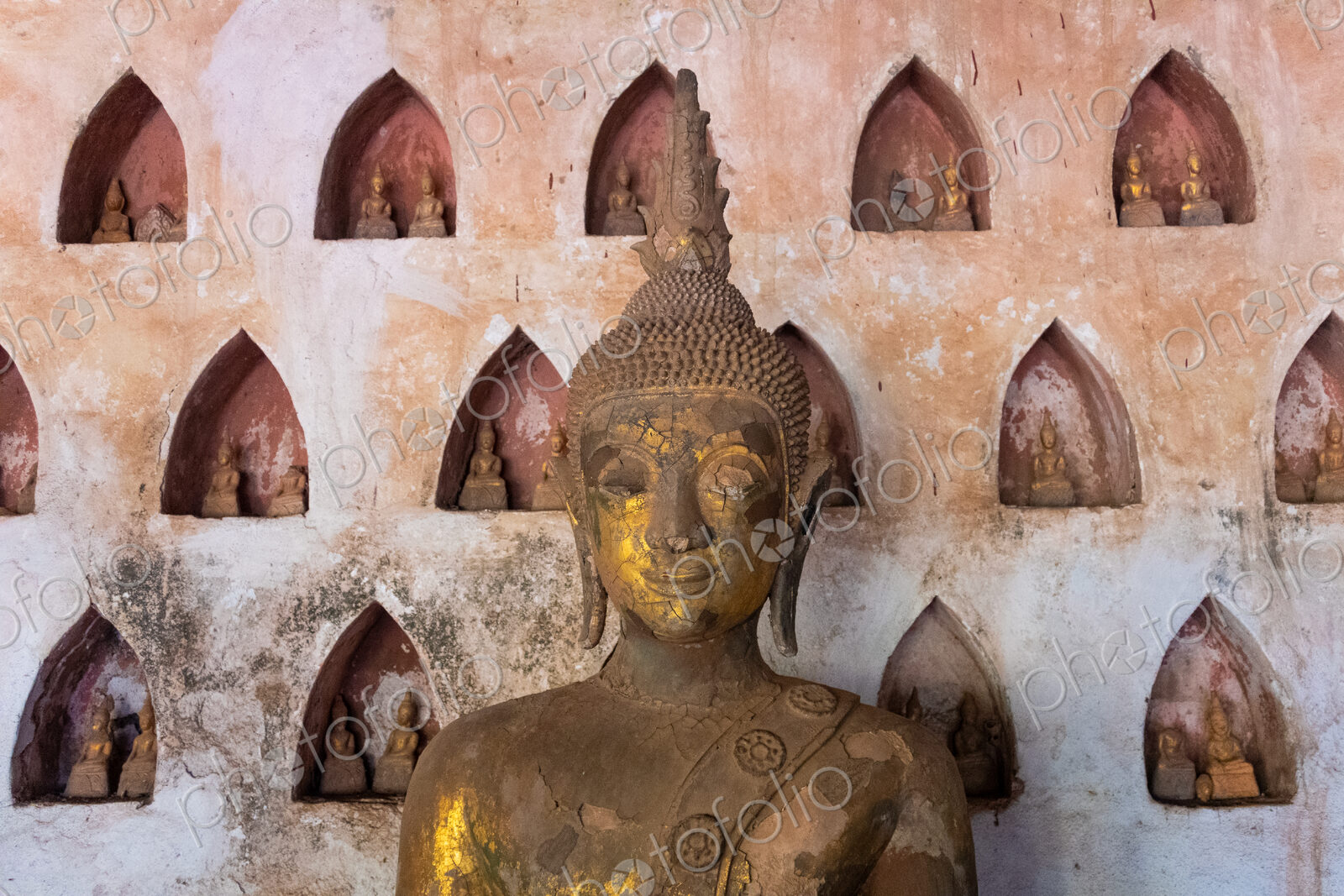 Wat Si Saket, a collection of statues in wall niches, Vientiane, Laos