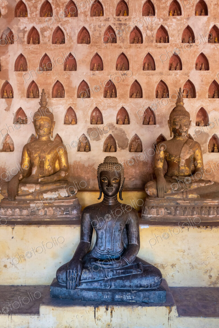 Wat Si Saket, a collection of statues in wall niches, Vientiane, Laos