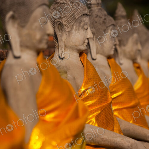Wat Yai Chai Mongkon, a historic Buddhist temple. Rows of seated Buddha statues,… Wat Yai Chai Mongkon, a historic Buddhist temple. Rows of seated Buddha statues,…