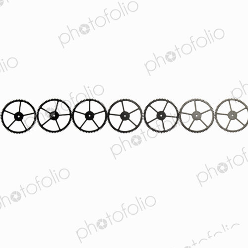 Watch gears, small precision made cog wheels with spokes and fine teeth or notches…