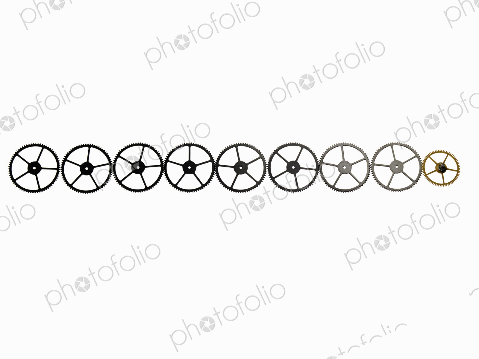 Watch gears, small precision made cog wheels with spokes and fine teeth or notches…
