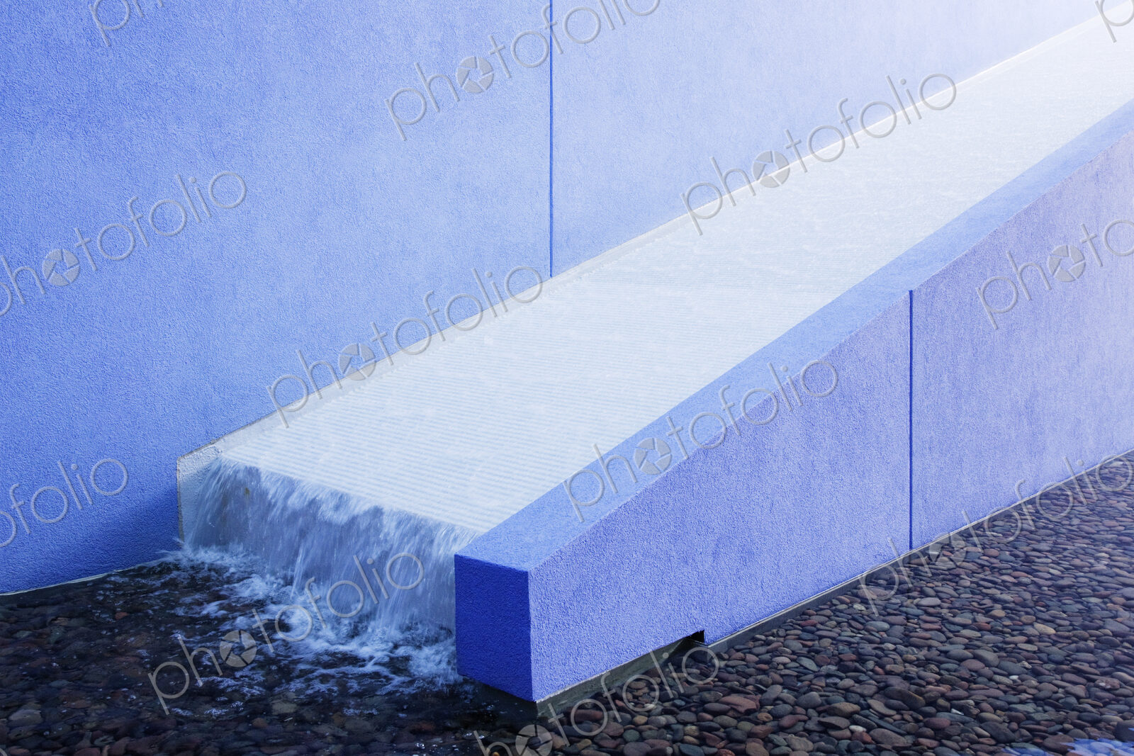 Water Running Down Ramp into Pool