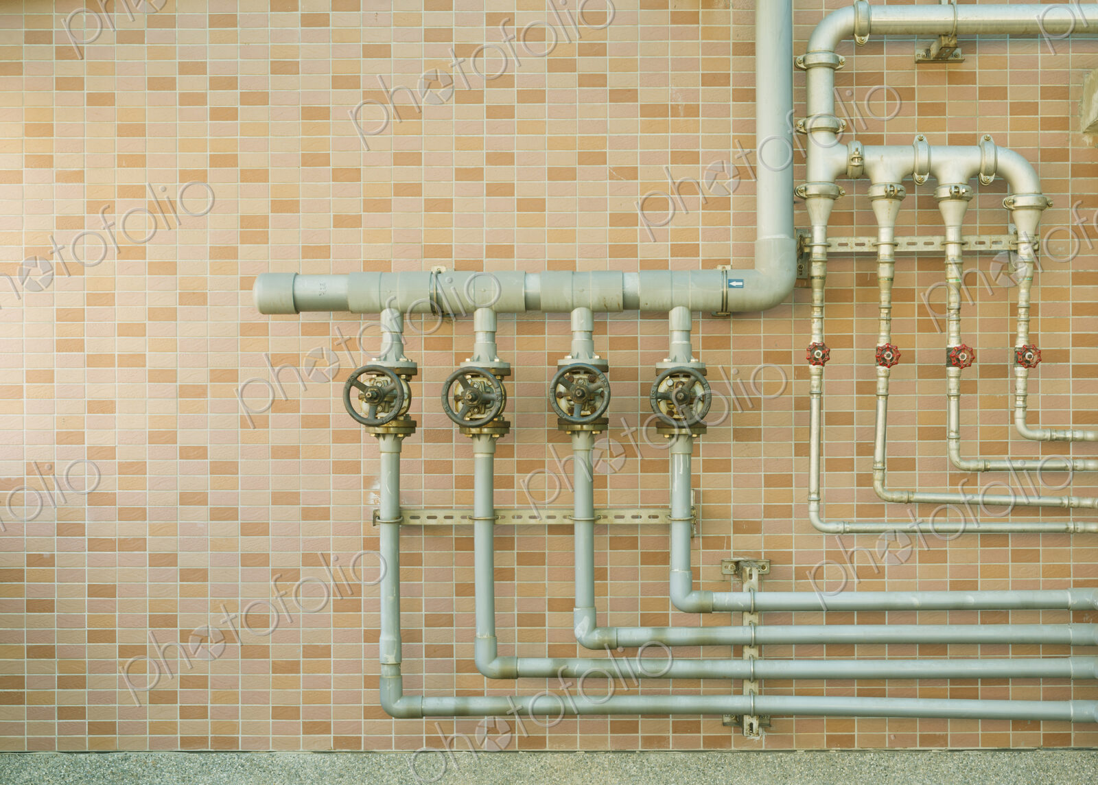 Water pipes on brick wall