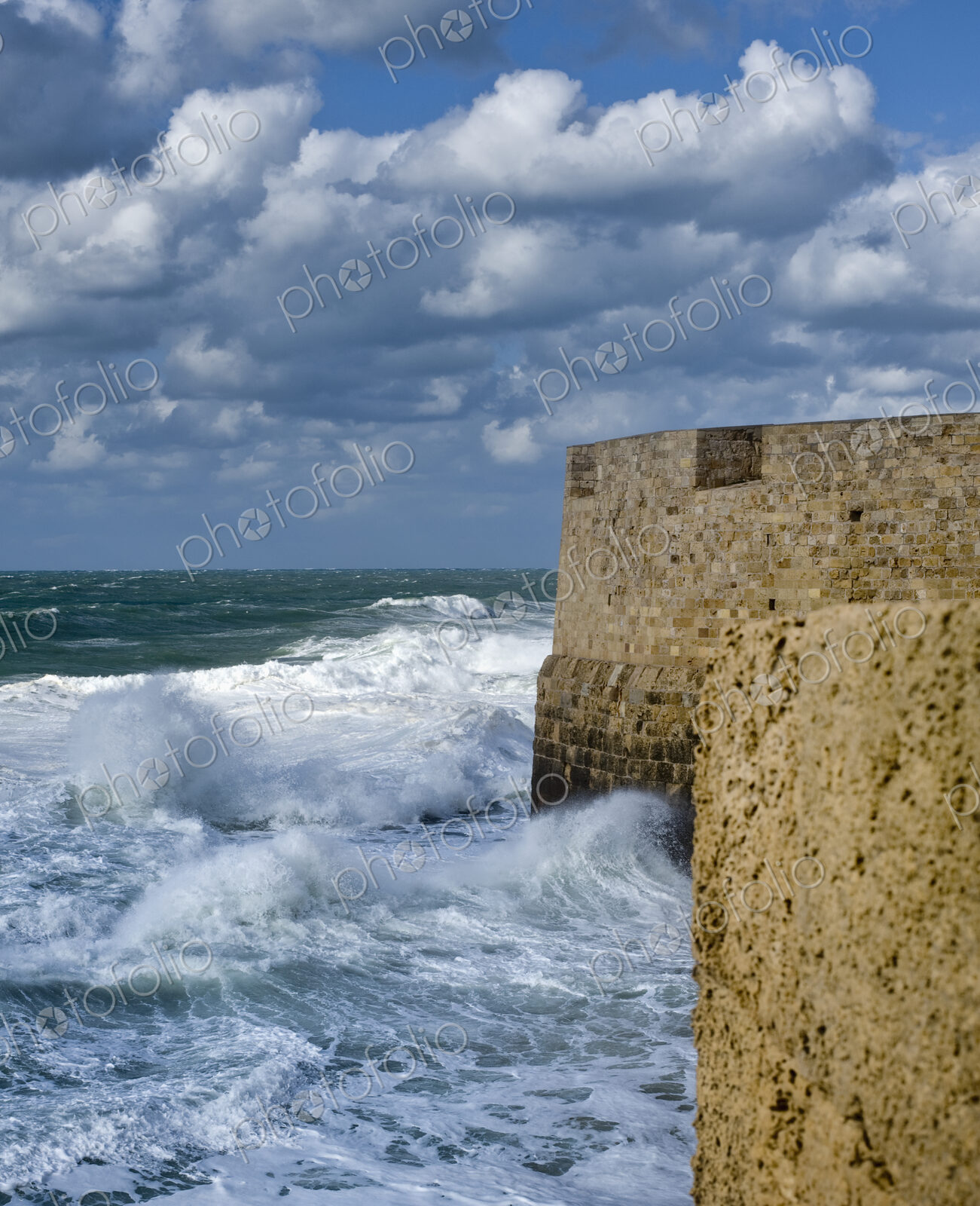 Waves Breaking Against Ancient Walls