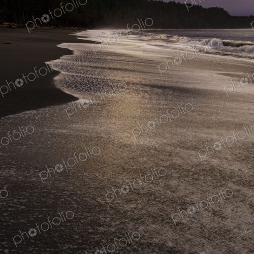 Waves breaking on beach along the Strait of Juan de Fuca, Port Angeles, WA USA