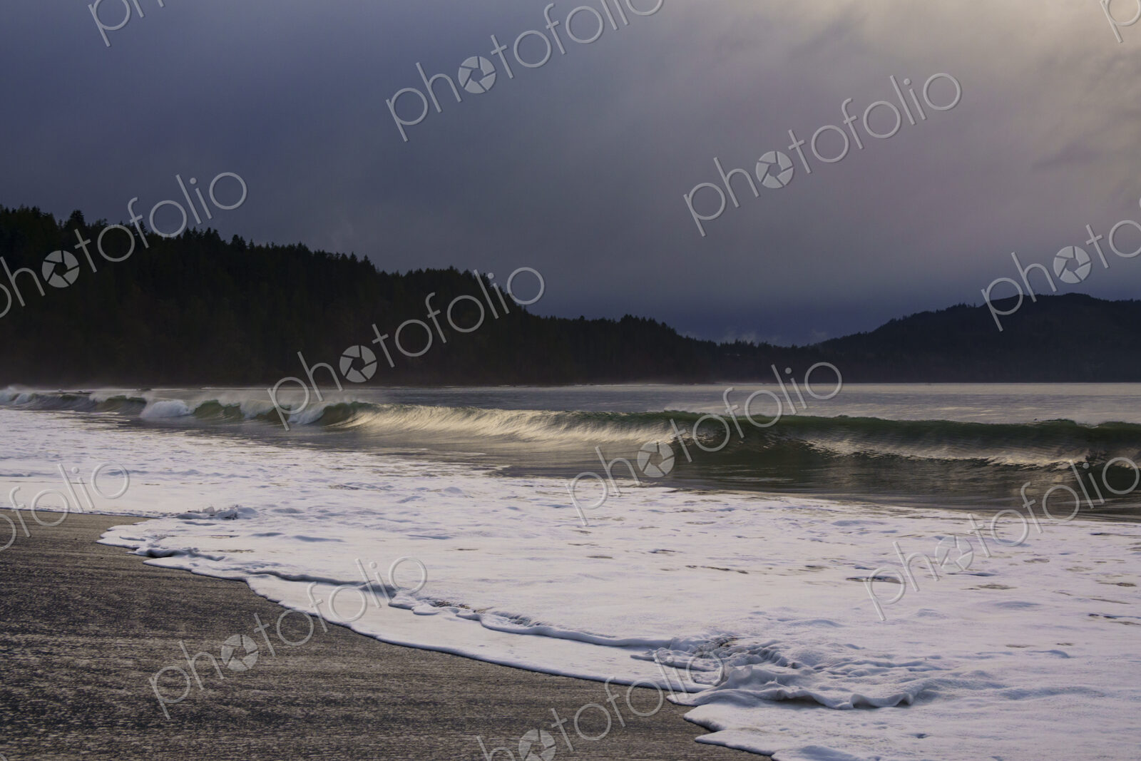 Waves breaking on beach along the Strait of Juan de Fuca, Port Angeles, WA USA