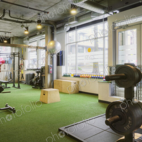 Weights room in an empty gym.