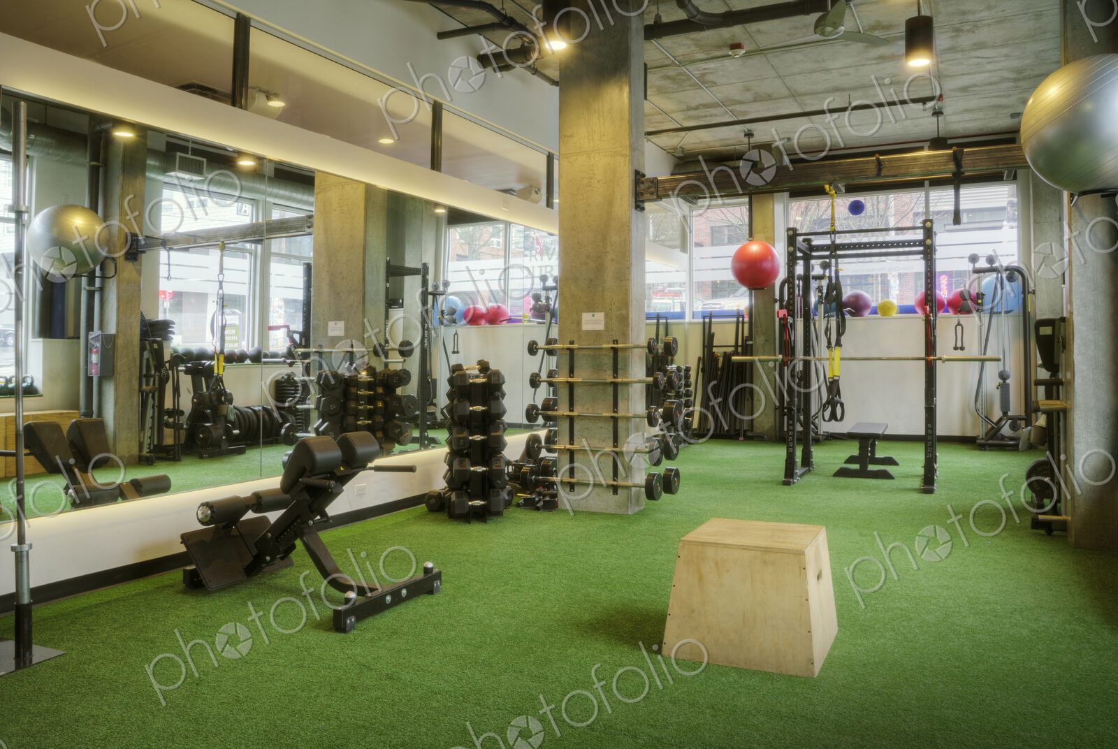 Weights room in an empty gym.