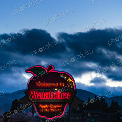 Welcome to Wenatchee town sign, Chelan County, an apple shape neon sign, under dark… Welcome to Wenatchee town sign, Chelan County, an apple shape neon sign, under dark…