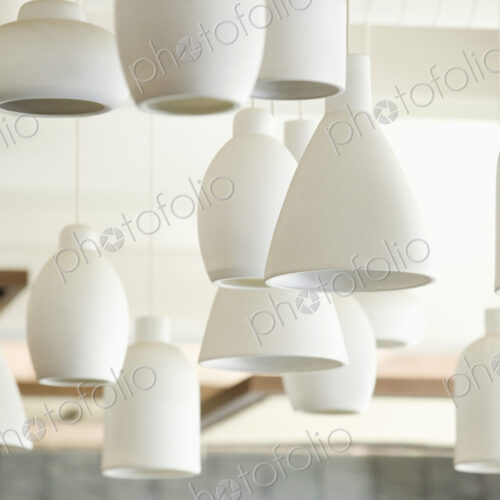 White Lighting Fixtures, pendant lights of varying sizes and shapes