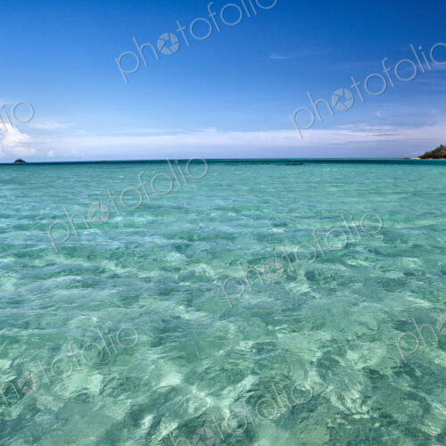 White Sand Seen Under Light Green Shallow Water White Sand Seen Under Light Green Shallow Water